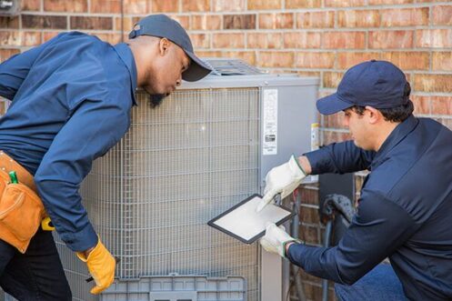 HVAC Technicians Performing AC Maintenance in Sparks, NV